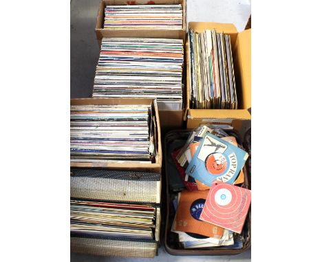 A large collection of various seven-inch and twelve-inch vinyl records to include Michael Jackson 'Thriller', Fleetwood Mac '