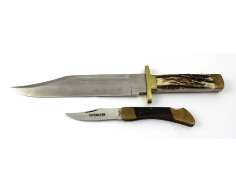 A Bowie knife with blade stamped for J. Nowill & Sons of Sheffield and antler handle, in leather scabbard, blade length 24.8c