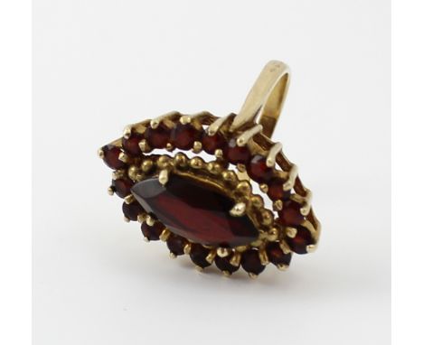 A 9ct gold oval garnet cluster ring, size O, approx 6.3g.