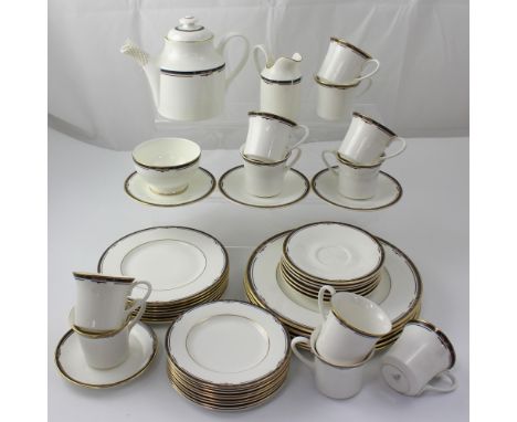 A Royal Doulton H5131 'Musicales' part tea service (the majority seconds).