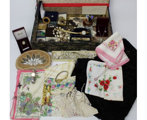 A quantity of mainly vintage costume jewellery and ladies' wristwatches to include dress clips, brooches, pendants, a silver 