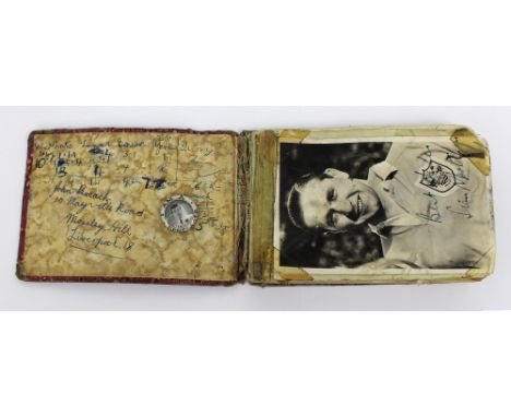 An autograph book containing predominantly c1950s autographs and photographs to include Robb Wilton, Terry-Thomas, Basil Rath
