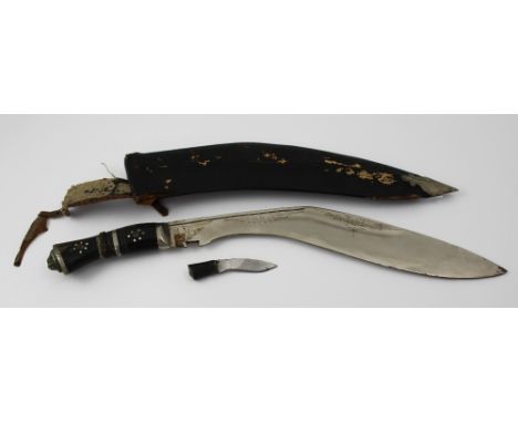 A 20th century Gurkha kukri knife marked 'India' below fuller, with horn handle and lion's head to pommel, blade length appro