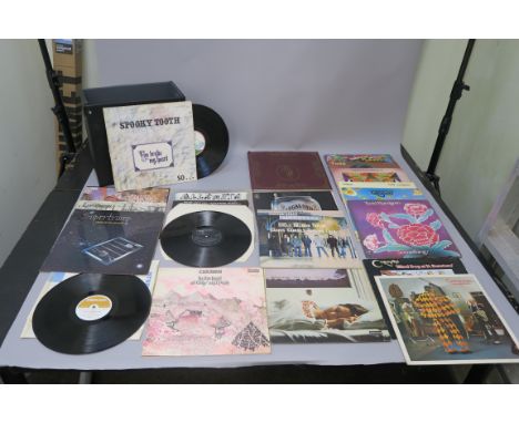 Collection of LP vinyl records in record box including Caravan In the Land of Grey and Pink SDL R1 Deram brown and white labe