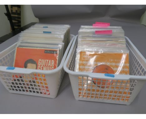 Two boxes of 7 inch singles including one box of EPs and one box of Bob Dylan singles from the 1960s to present day including