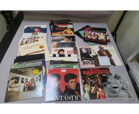 Record box of vinyl LP records including Madness, Neil Diamond, Ray Charles, Roxy Music, George Michael, Michael Jackson, Abb