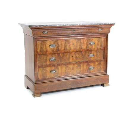 A mid-19th century French (Louis Philippe) flame mahogany and black variegated marble topped commode, with four long drawers,