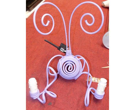 A French 'Diablo' wall light, designed in 2009 by Mathieu Challieres, of twin arm construction, covered in lilac cloth and hu
