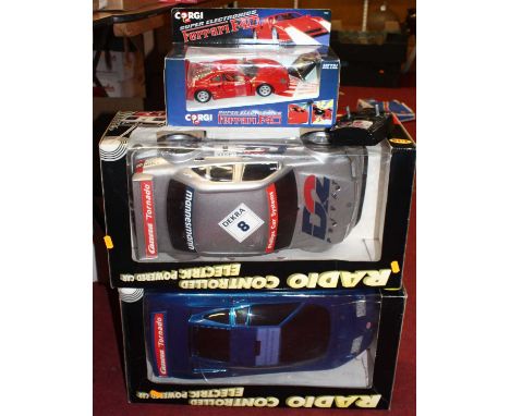 A Carerra Tornado 1/10 scale group of two boxed radio controlled electric powered cars together with a Corgi No. 94625 Super 