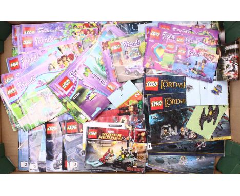 One tray containing a quantity of mixed Lego construction catalogues to include Lord of the Rings, Lego Friends, Lego Marvel 