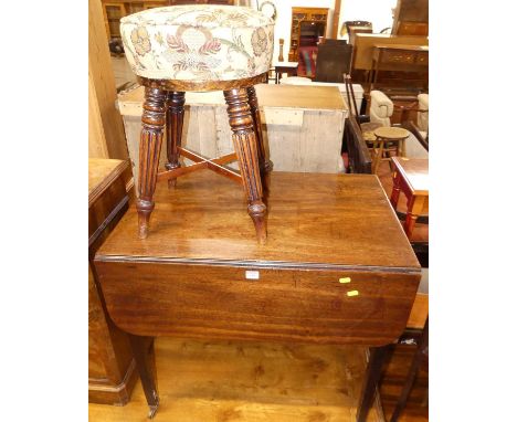 A Regency mahogany Pembroke table, having single end drawer and raised on square cut supports to castors, together with a 19t