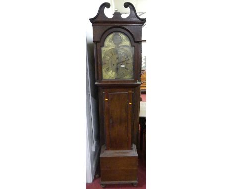A circa 1800 oak longcase clock, the arched brass dial signed William Dalrymple, Kilmarnock, having twin winding holes for an