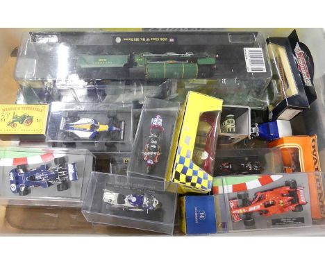 One tray containing static models of locomotives including N gauge A1s and a 00 gauge schools class, and racing cars, togethe