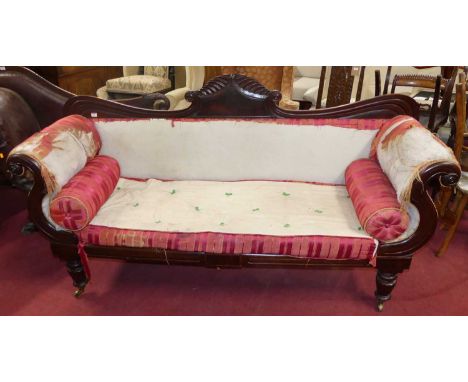 A mid-Victorian mahogany framed three-seater double scroll end sofa, having partial silk striped fabric upholstery, raised on