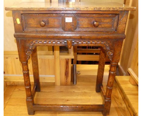 A contemporary joined and moulded oak (possibly Titchmarsh &amp; Goodwin) small single drawer side table, in the 17th century