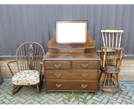 An Edwardian walnut swing mirrorback dressing chest, together with an Ercol dark elm rocking armchair, and three elm and frui
