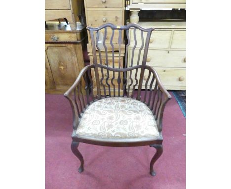 An Edwardian mahogany narrow slat back tub elbow chair, with tapestry upholstered fixed pad seat, width 59cm