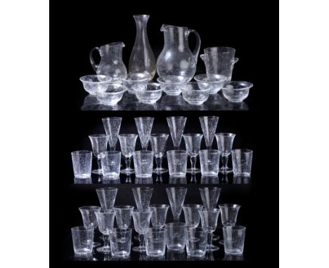 Biot of France glass suitebubble-blown drinking glasses, comprising eight champagne flutes, 21.5cm high overall, thirteen win