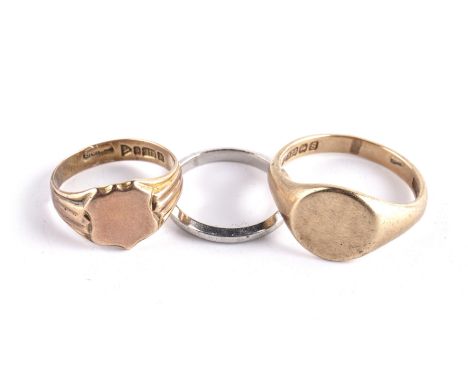 Group of three rings One is a plain platinum band, size K/L, the second is a 9ct gold signet ring with almost circular cartou