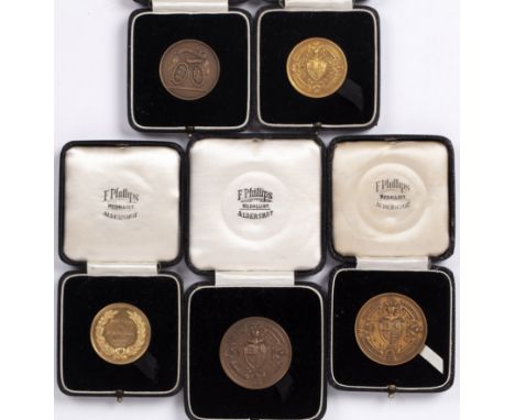 Collection of five medals awarded by the 'Amateur Athletics Association championships', two 9ct gold examples and three bronz