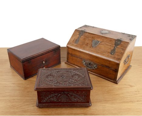 Aesthetic movement Oak, tobacco or cigar box, with applied metal mounts and handles, with fitted interior, the sloped front l