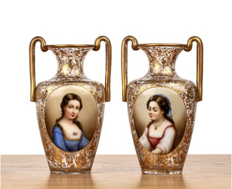 Pair of Bohemian glass vases19th Century, each with an enamel painted panel decorated with a portrait of a lady, with gilt pa