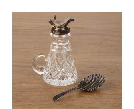 Two pieces of silver Comprising a silver caddy spoon with shell shaped bowl, indistinct marks to the reverse, 9cm overall and