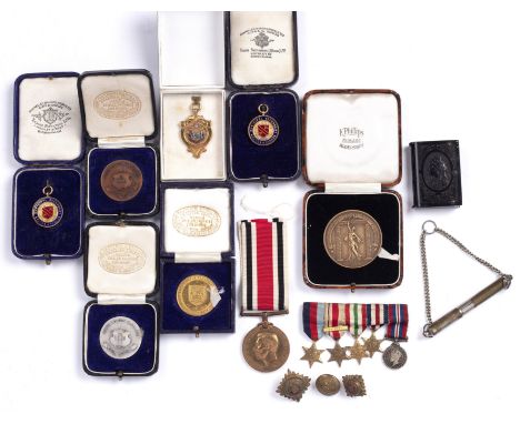 Collection of various medals and medallions Comprising a set of medal miniatures, acme whistle, three tunic buttons, vesta ca