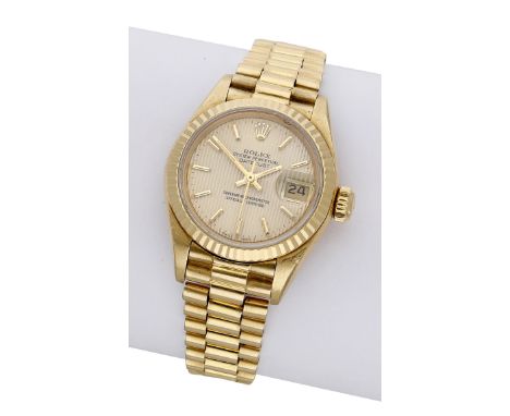 Rolex. A lady’s gold automatic wristwatch with date and bracelet, Ref. 69168, Datejust, circa 1988. Movement: cal. 2135, auto