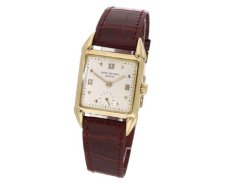 Patek Philippe. A gold square wristwatch, Ref. 2411, circa 1950. Movement: manual winding, 18 jewels, no. 952715. Dial: silve