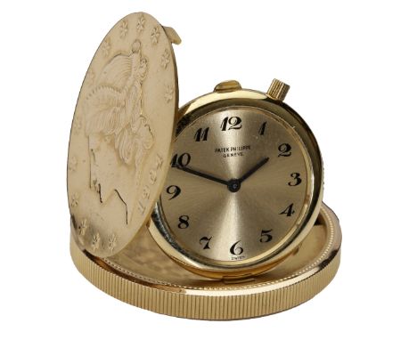 Patek Philippe. A rare gold twenty dollar coin watch, Ref. 803, 1974. Movement: cal. 175, ultra-thin, manual winding, no. 117