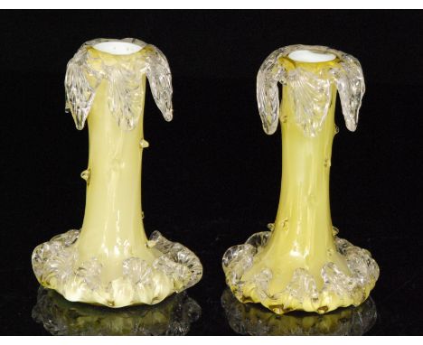 A pair of late 19th Century John Walsh Walsh glass posy vases, the citron over opal body of low shouldered form with applied 