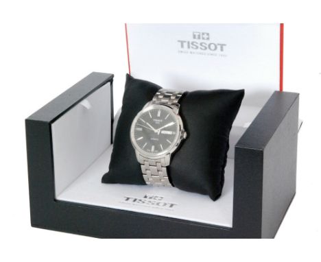 A Tissot gentleman's stainless steel automatic bracelet wristwatch, the black circular dial with stainless steel baton marker