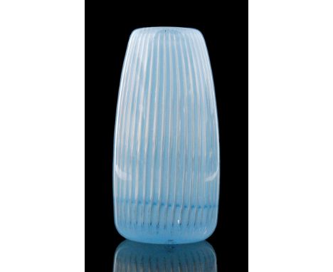 A post war Orrefors Ariel glass vase designed by Edvin Ohrstrom, of swollen sleeve form cased in clear crystal over a pale bl