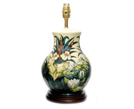 A Moorcroft Pottery table lamp base decorated in the Lamia pattern designed by Rachel Bishop, marks obscured by affixed woode