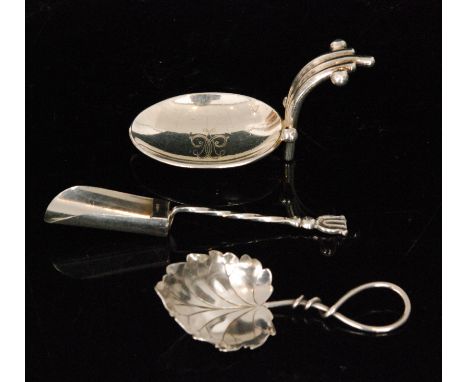 An American Sterling silver veined leaf caddy spoon with wirework handle stamped William Wise and Son Sterling, 127, a Maltes