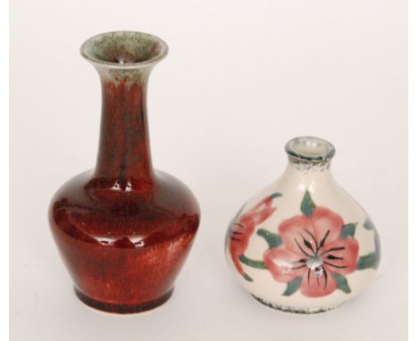 Two Cobridge Pottery vases, the first of globe and shaft form glazed in sang de boeuf, height 15.5cm, the second of squat for