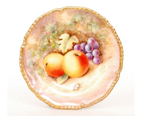 A Royal Worcester Fallen Fruits side plate decorated by J. Reed with hand painted apples and black grapes, signed, black prin