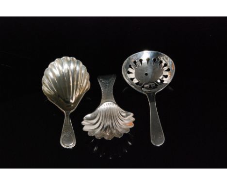 A George III hallmarked silver caddy spoon with fluted shell bowl and bright cut handle, London 1786, Hester Bateman, another