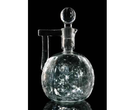 A late 19th Century Stevens & Williams rock crystal glass claret jug in the Aesthetic taste, of pillar moulded globe and shaf