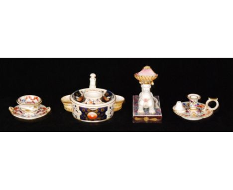 Three pieces of 19th Century Derby porcelain comprising a taper stick, table salt and an inkwell, all with gilt and enamel de