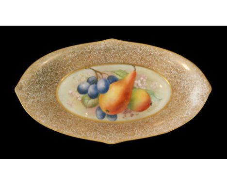 A Royal Worcester oval Fallen Fruits dish decorated to the central well with hand painted pears and black grapes by R. Philli