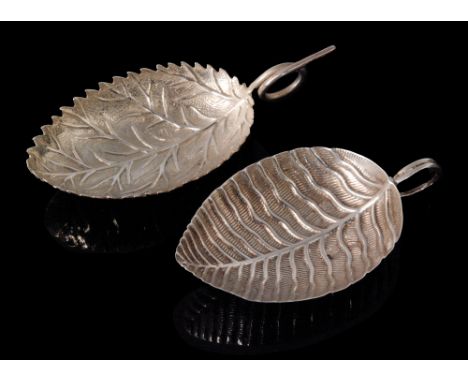 A George III hallmarked silver caddy spoon with veined leaf bowl below coiled wirework handle, Birmingham 1806 Joseph Wilmore