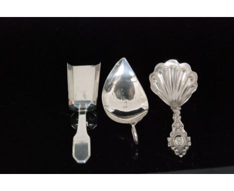 A William IV  hallmarked silver shovel shaped caddy spoon with oversized scoop, London 1833, William Eaton, a shell bowl exam