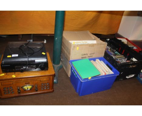 A ITKA RADIO AND RECORD PLAYER TOGETHER WITH A QUANTITY OF RECORDS ETC