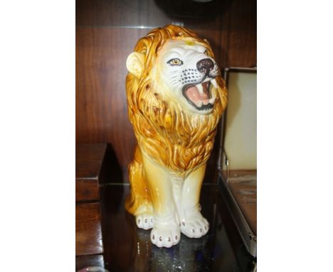 A LARGE CERAMIC LION