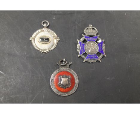 TWO HALLMARKED SILVER AND ENAMEL MEDALLIONS TOGETHER WITH A STIRLING SILVER EXAMPLE