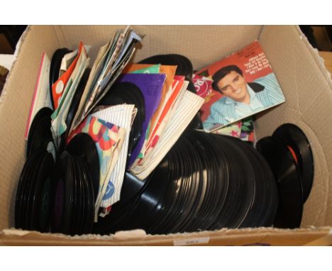 A BOX OF SINGLES TO INCLUDE ELVIS