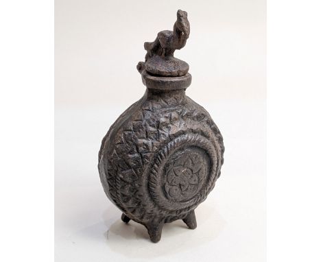 A metal gunpowder flask, possibly Turkish (a/f)