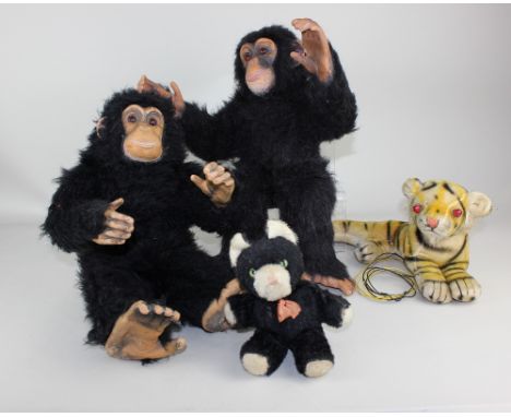 Two Dean's Childsplay toy chimps, one with yellow label, together with a plush toy musical cat with extending head and a plus